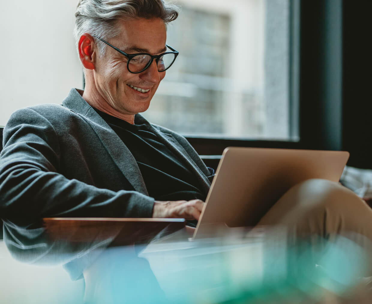 Man looking at his laptop